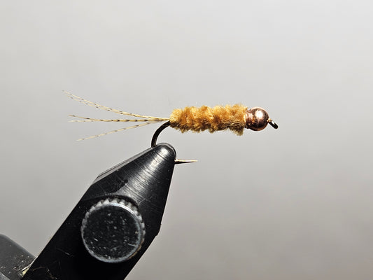 Maple syrup fly pattern, a New England pond classic invented by Maine angler and tyer Alvin Theriault, tied by New England Fly Company