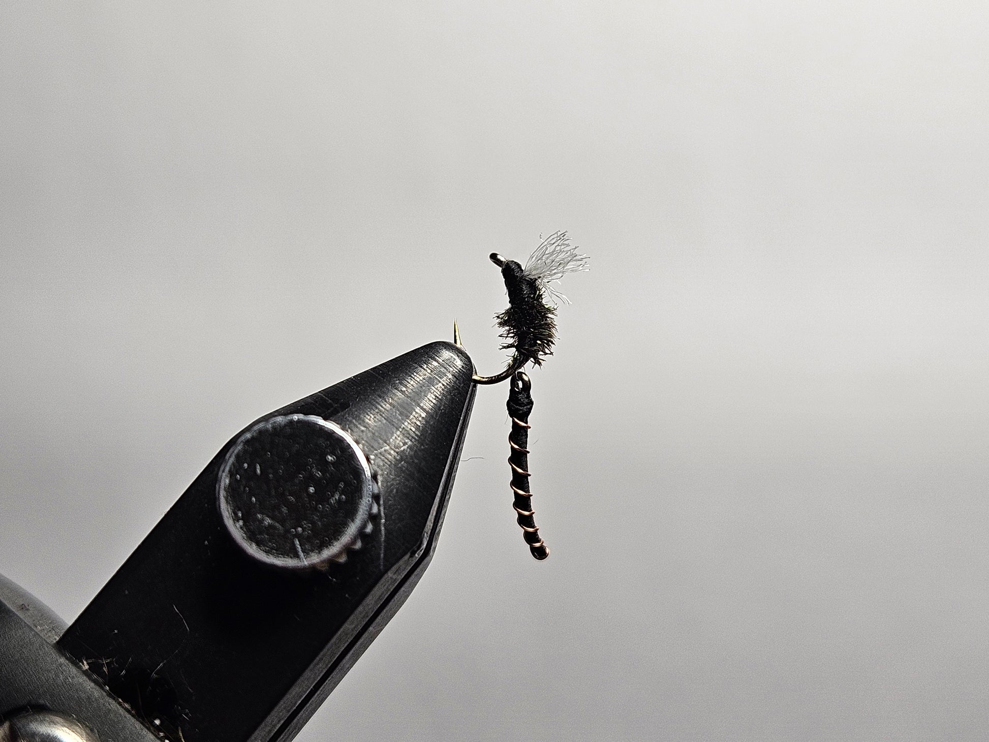 An articulated midge fly pattern tied by New England Fly Company.